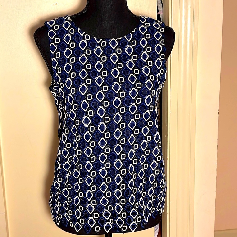 Beautiful, lined vest with bold, geometric pattern in black, blue & white.